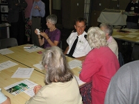 Residents talking with Harriette Dottridge former HQ NW Co-ordinator and Hywel David
