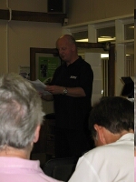 Bill addressing the room