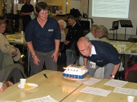 Ron blowing out the candles