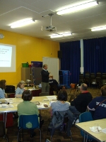 The audience listening attentively