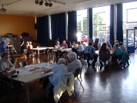 Mark Venables listening attentively while the hall fills up