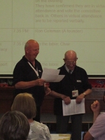Bill presenting Ron with an award for all his hard work