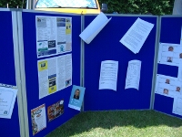 Copies of recent newsletters on display